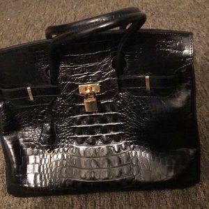Black crocodile skin bag